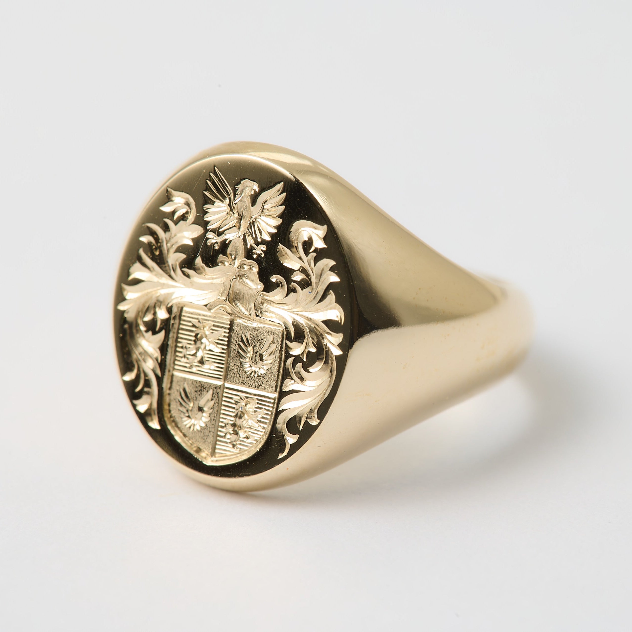 Yellow gold signet ring with a hand engraved Coat-Of-Arms