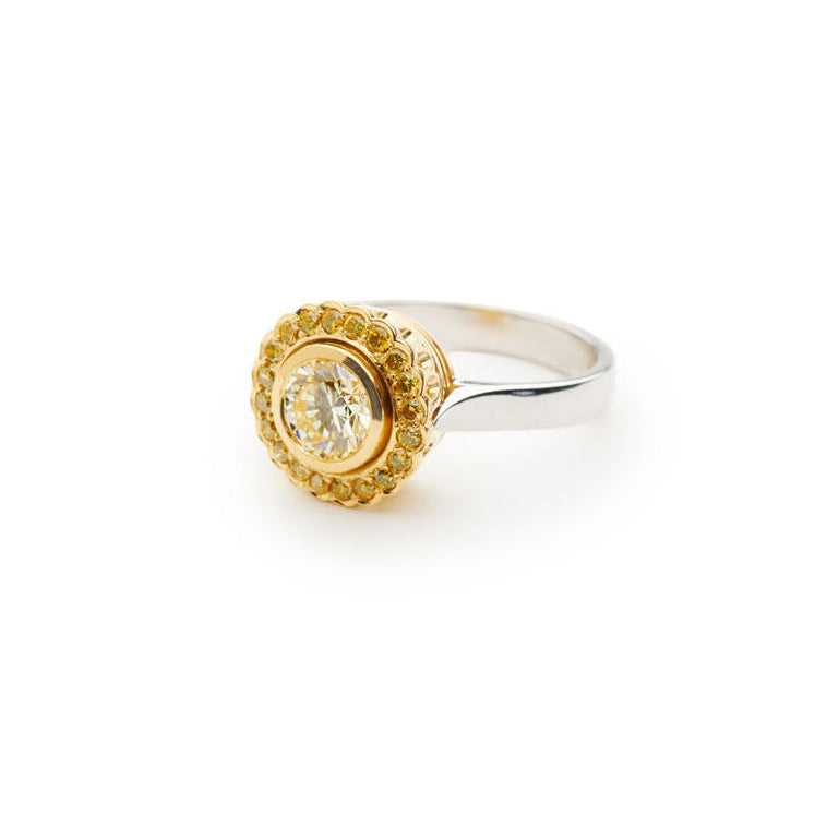 Cape diamond surrounded by yellow diamonds, set in white and yellow gold