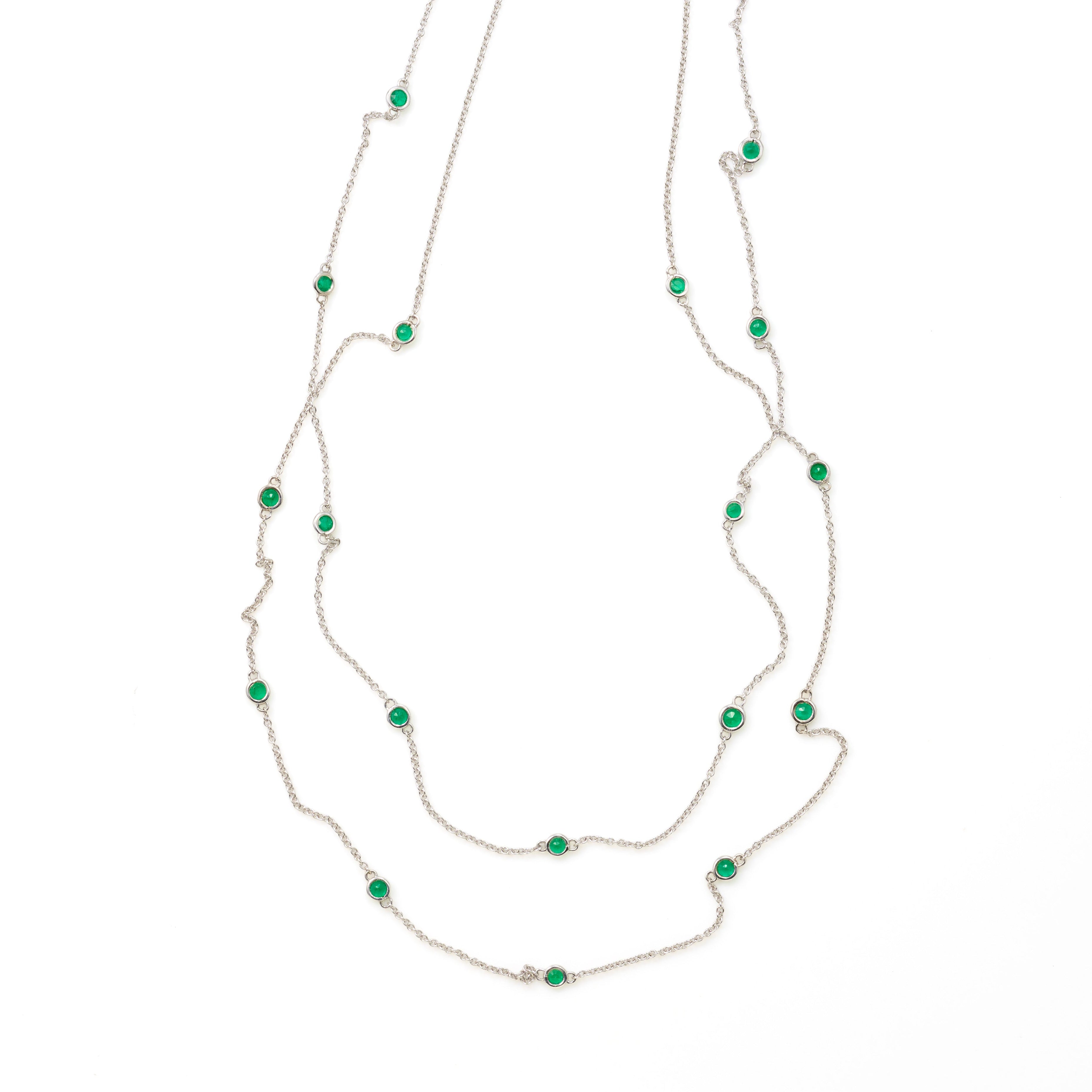 Necklace with round emeralds rim-set